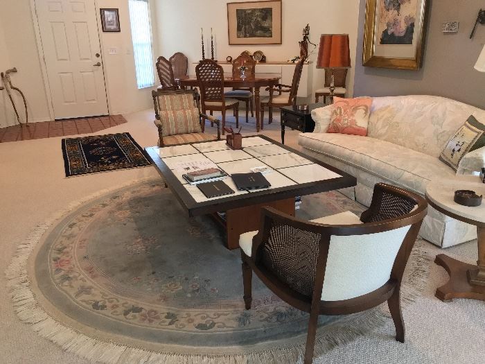 rugs, couch, side tables, mid century side chair, victorian side chair, marble & wood coffee table.
