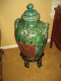 Chinese pottery oil urn on stand