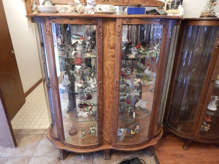 Various Curio cabinets with collectables