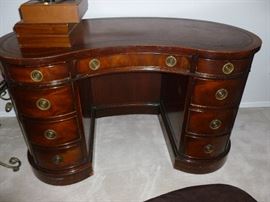 Vintage leather-top kidney-shaped mahogany desk