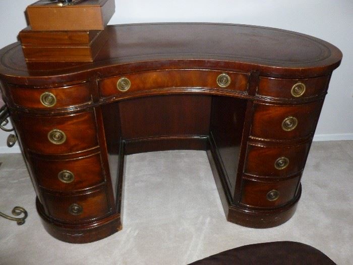 Vintage leather-top kidney-shaped mahogany desk