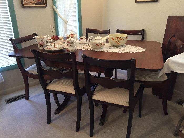 Antique dining table with 6 chairs