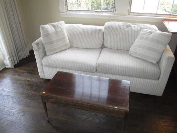 Two seater sofa sleeper and coffee table