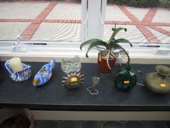 Pottery, glass and plants