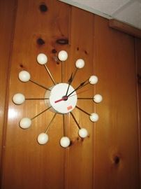 Unusual wood ball starburst clock