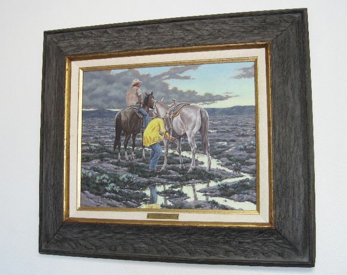 1979 oil on canvas painting of two cowboys in a western marsh landscape, one dismounted and tightening the cinch of his saddle, entitled "Loose Cinch", by Dave Paulley (Osage, Wyoming), 16" x 20" in a 26" x 30" frame