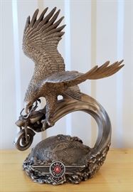 1999 pewter sculpture of an eagle seizing a Harley Davidson motorcycle in its talons above the earth, entitled "Thunder in the Sky", issued by The Franklin Mint, 10" x 8" x 5"