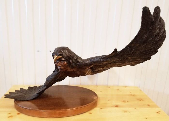 Bronze sculpture of an eagle in flight with the face of a Native American man, #12/50, entitled "Spirit of Eagle Dancer (The Shaman)", by William Cie Conway (Texas, 20th century), 20" x 36" x 32"