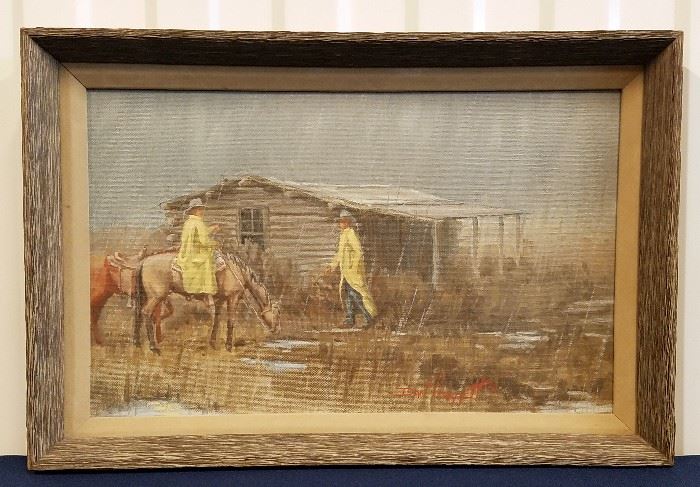 1975 oil on board painting of two cowboys in yellow slickers with horses in front of a log cabin in the rain, entitled "Cowboys" by Dan Garrett (Casper, Wyoming, 1948-), 11" x 17" in a 12" x 18" frame