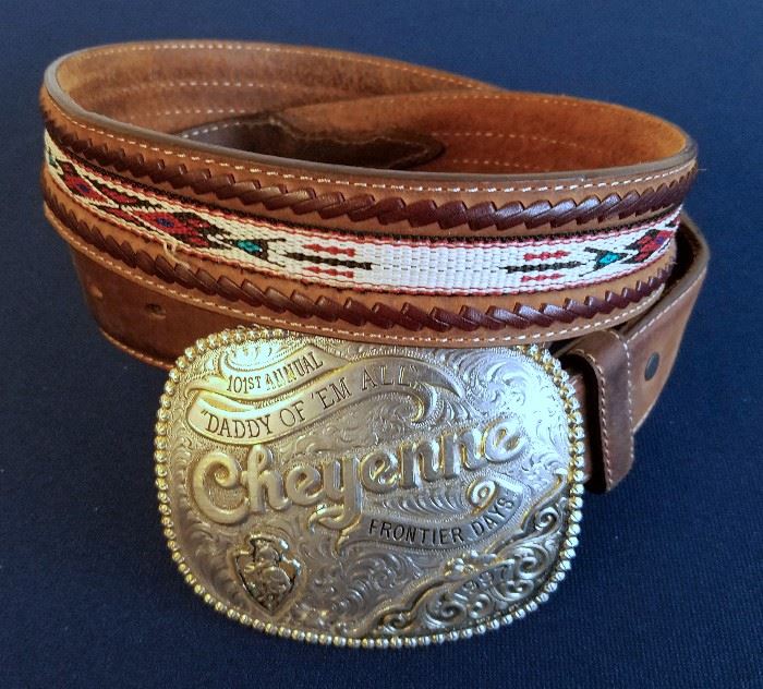 Commemorative limited edition bronze 1997 Cheyenne Frontier Days belt buckle, #352/500, by Gist, 3 1/2" x 4", on a size 36 Silver Creek leather belt