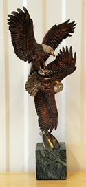 Limited edition mixed media metal sculpture of two eagles fighting, #420/2500, entitled "Food Fight", by Kitty Cantrell (California), issued in 1992 by Legends, 17" x 7" x 5"