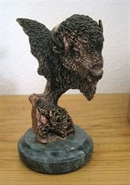 Limited edition mixed media metal sculpture of the head of a buffalo, #871/2500, entitled "Buffalo Spirit" by Kitty Cantrell (California), issued in the early 1990s by Legends, 6" x 3" x 3"