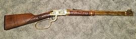 1997 Central Wyoming Fair and Rodeo 50th Anniversary 1947-1997 special limited edition Winchester Model 94AE rifle, lever action, angle eject, 30-30 Win caliber, with gold plated receiver, trigger, barrel and lever, engraved with rodeo scenes by A&A Engraving, Rapid City, South Dakota, laser engraved walnut stock and fore stock, Serial #6159224. No box or case.
