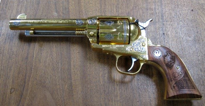 1996 Cheyenne Frontier Days "Daddy Of 'Em All" special limited edition Ruger Vaquero revolver, #90/100, 45 caliber, gold plated and engraved with Western designs by A&A Engraving, Rapid City, South Dakota, laser engraved walnut grips, Serial #55-27090