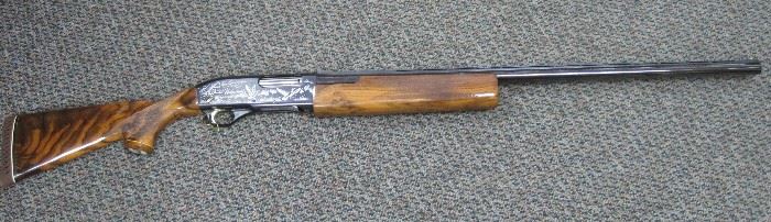1979 Ducks Unlimited Patrician II shotgun by Weatherby, 12 gauge, 2 3/4" and 3" chamber, slide action, receiver photo engraved with ducks rising from a marsh, trigger gold plated, checkered wood stock, Serial #79-DU-0100. No box or case.