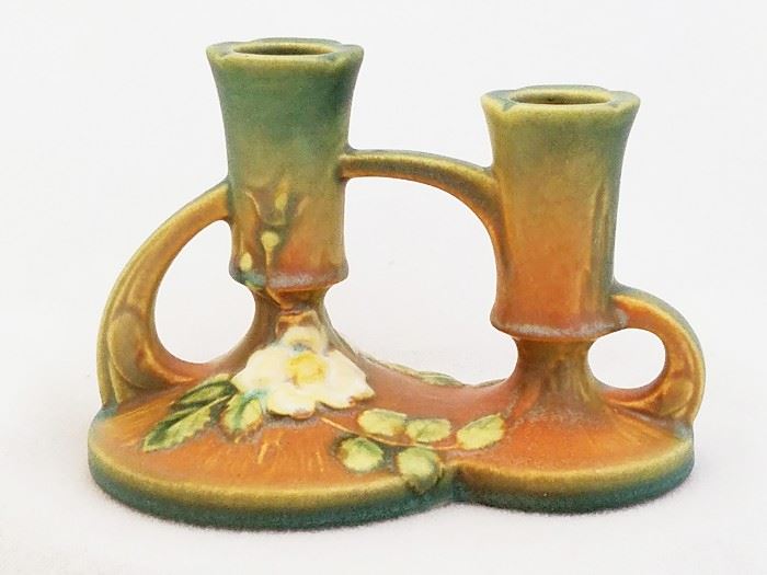 Single 1940 Roseville Pottery White Rose 1143 Double Candlestick. Excellent condition. Guaranteed to be an original 1940 piece.