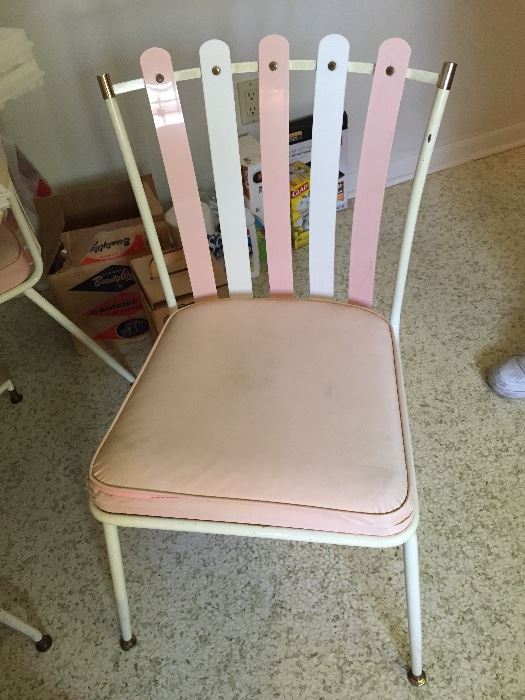 Daystrom chairs and table.  Small split at corner of chair seat.  There is glitter in the paint on legs.