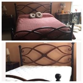 Heavenly mattress and box spring in a KING size with a heavenly gorgeous swirly 2 tones Black/brown wood frame. Includes 2 bedside tables with drawers. This is a beautiful set, in excellent condition. The drawers need new pull handles.