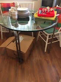 Glass and chrome dining table