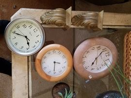 selection of clocks, two small wall sconce shelves
