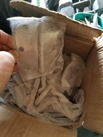 Box of brand new hinges