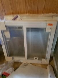 Brand new double pane windows still in plastic wrap. 