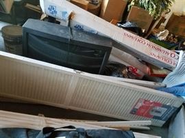 2 sets of brand new in wrapper big old doors, we also have baseboard, trim and tile