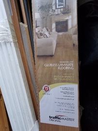 5 boxes of new laminate flooring. We also have a few rolls of the sponge mat that goes beneath the flooring available for sale.