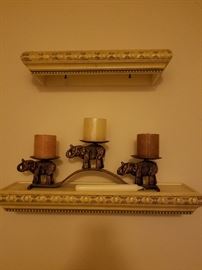 Heavy metal elephant candle holder with candles. Shelves sold separately.