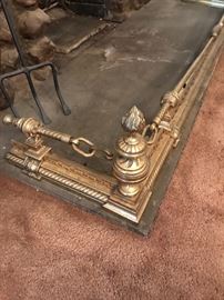Unusual brass fireplace surroung