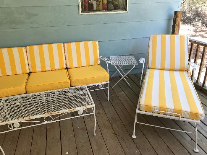Matching set which includes Glass table, Four Matching Chairs, Couch, Coffee Table and Chairs.  Iron and Super Cute Yellow Upholstery!