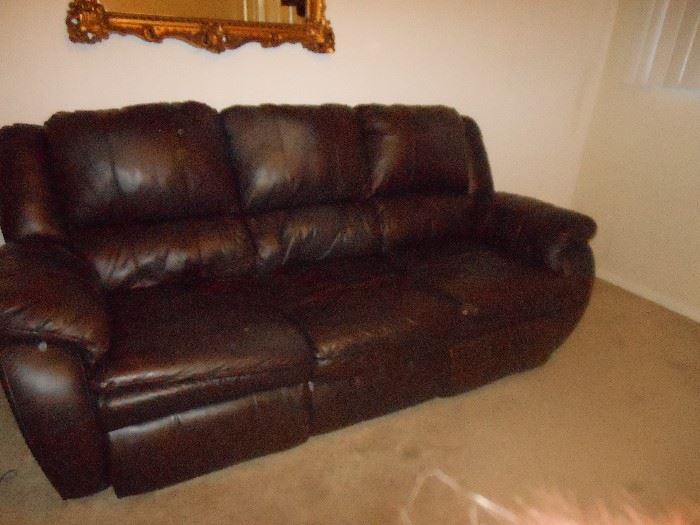 Dual reclining leather look sofa