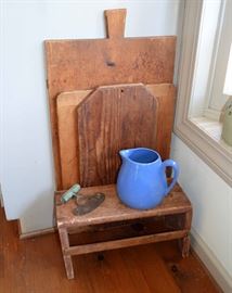 old cutting boards; chopper; Hall pitcher; painted stool