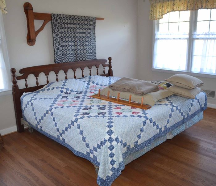 king size bed; quilt rack