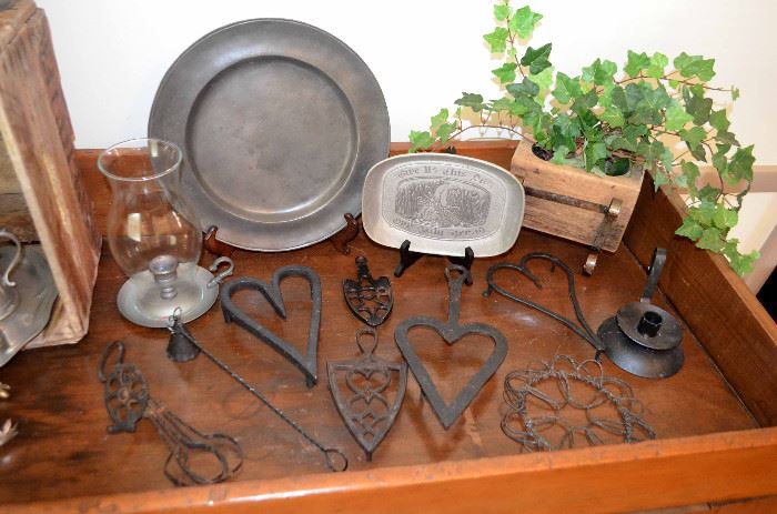 pewter; iron trivets 