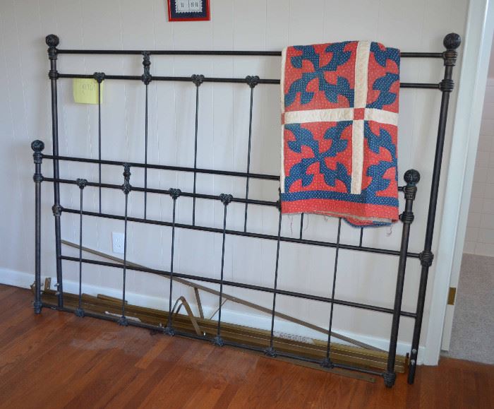 iron bed; quilt