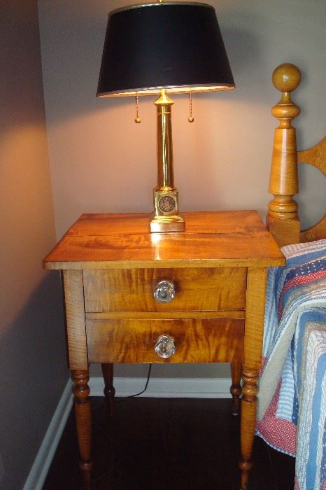 Tiger maple stand with 1923 Harvard University brass lamp.