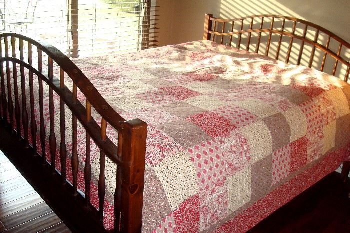 Custom made vintage Mission style queen bed and quilts.