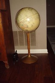 Vintage world globe on stand.