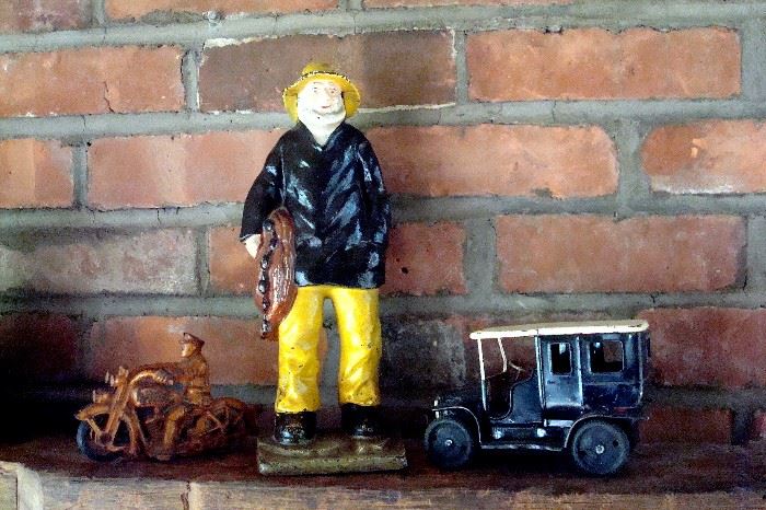 Antique toys and cast iron sailor doorstop.