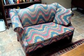 Vintage Chippendale style custom upholstered love seat.