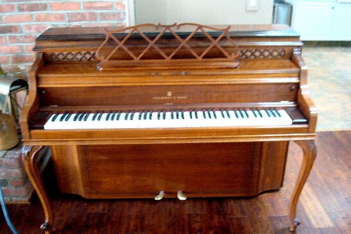 Steinway & Sons upright piano with QRS player system.