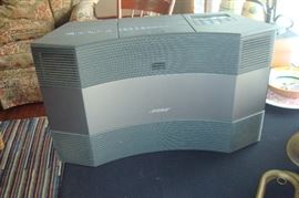 Bose Acoustic wave radio/cd with remote & carrying case, and extra speakers.