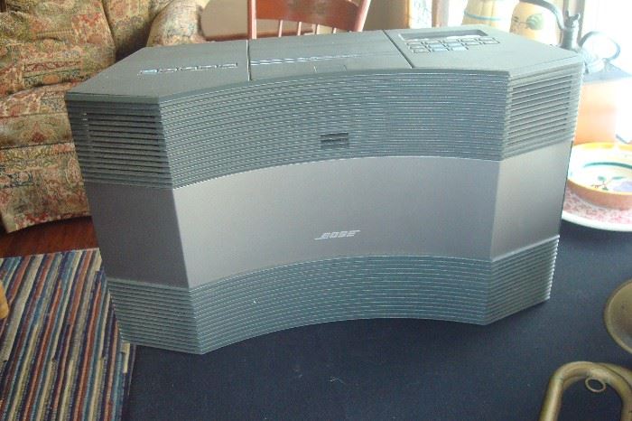Bose Acoustic wave radio/cd with remote & carrying case, and extra speakers.