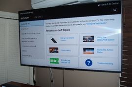 Sony 55 inch smart HDTV, no stand, mounted on bracket, bracket not for sale.