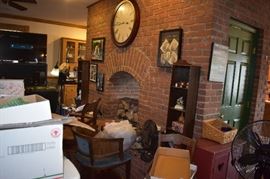 Awesome Brick Fireplace accented with Display Cabinets, Pictures and Prints, and more!