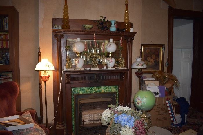 The Fireplace Mantle in this room ( dates back to 1828 ) and is adorned and surrounded by many wonderful Antique Items