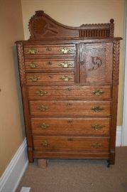Gorgeous Antique Gentlemen's American Oak Dresser featuring a combination Finial Backing with Carved Scrolling has 7 Drawers plus a Cabinet for your Stylish Hat!