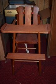 Antique Wooden High Chair featuring a Back that actually adjusts also noticed the Round Wooden Roller's between the Wooden Slats ( I wonder if this was to massage the Baby's Back while He/She ate? )