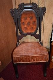 Highly Carved Victorian Parlor Chair with red velvet "tufted" Oval Back padded Seat